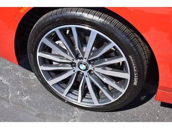 2021 BMW 2 Series 228i xDrive - sedan - $33,250 (BMW 2_ Series Melbourne Red Metallic)