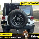 - 2014 Jeep Wrangler Unlimited Sport SUV 4D 4 D 4-D (Drive hub)